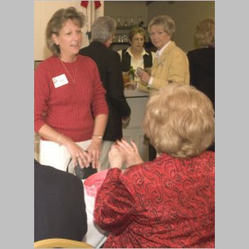 58 Janet Caffee at the raffle table.jpg