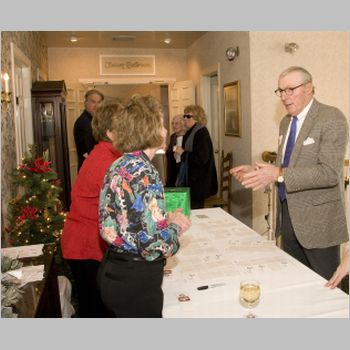 60 Henri David at welcome table.jpg