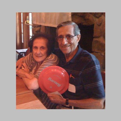 Description: Ann and Hal, and they won a Barney frisbee.jpg